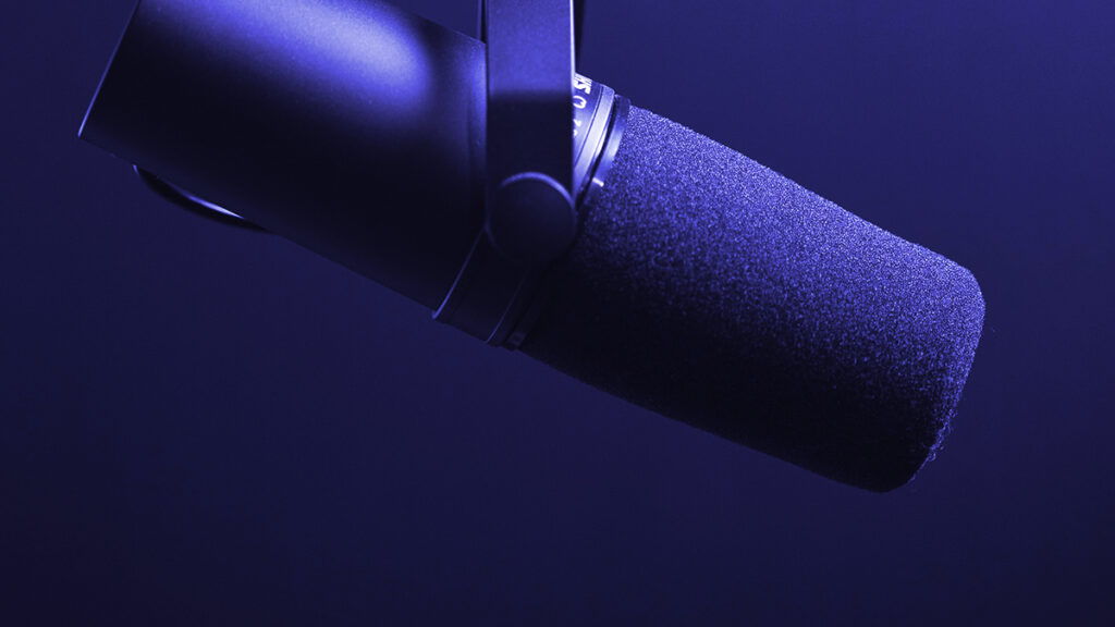 Purple hue close up of a microphone