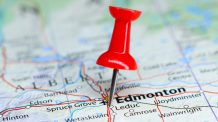 Pinpointed location of a city, country on a map. Red pushpin highlighting a location.